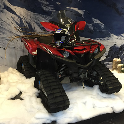 A Grizzly ATV tricked up with a Camoplast 4TS track conversion kit.