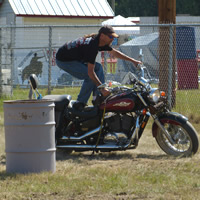 Rick Dakota doing stunts on his motorcycle