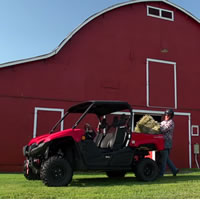 Darryl Sutter on his farm with the Yamaha Viking side by side