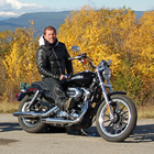 Doug Beale takes a break along Highway 52 while riding the Tumbler Ridge Circle Tour.