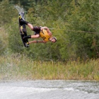 Wakeboarder flipping in the air