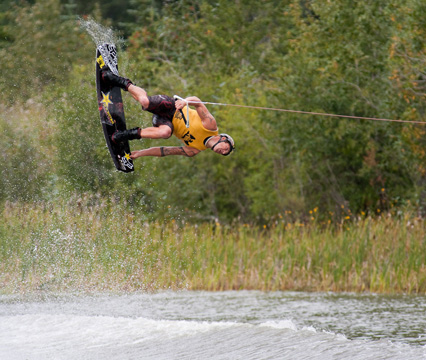 Wakeboarder flipping in the air