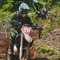 Shane Cuthbertson riding a section of offroad track. 