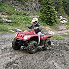 Kali Love heads into the mud mania pits near Panorama BC