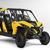 A yellow and black four seater UTV. 