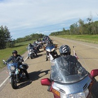 Members of the Mackenzie Highway Motorcycle Association  enjoy a ride on the High Level Circle Tour.
