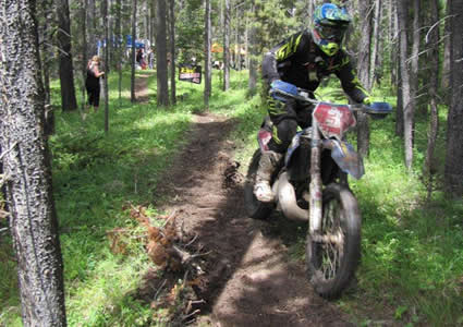 A man on an offroad bike. 