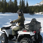 Photo of someone ATVing over snow