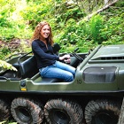 Photo of Kali Love sitting on a Argo ATV