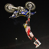 Clinton Moore performs a cliffhanger trick at the Red Bull X-Fighters in Mexico City. 